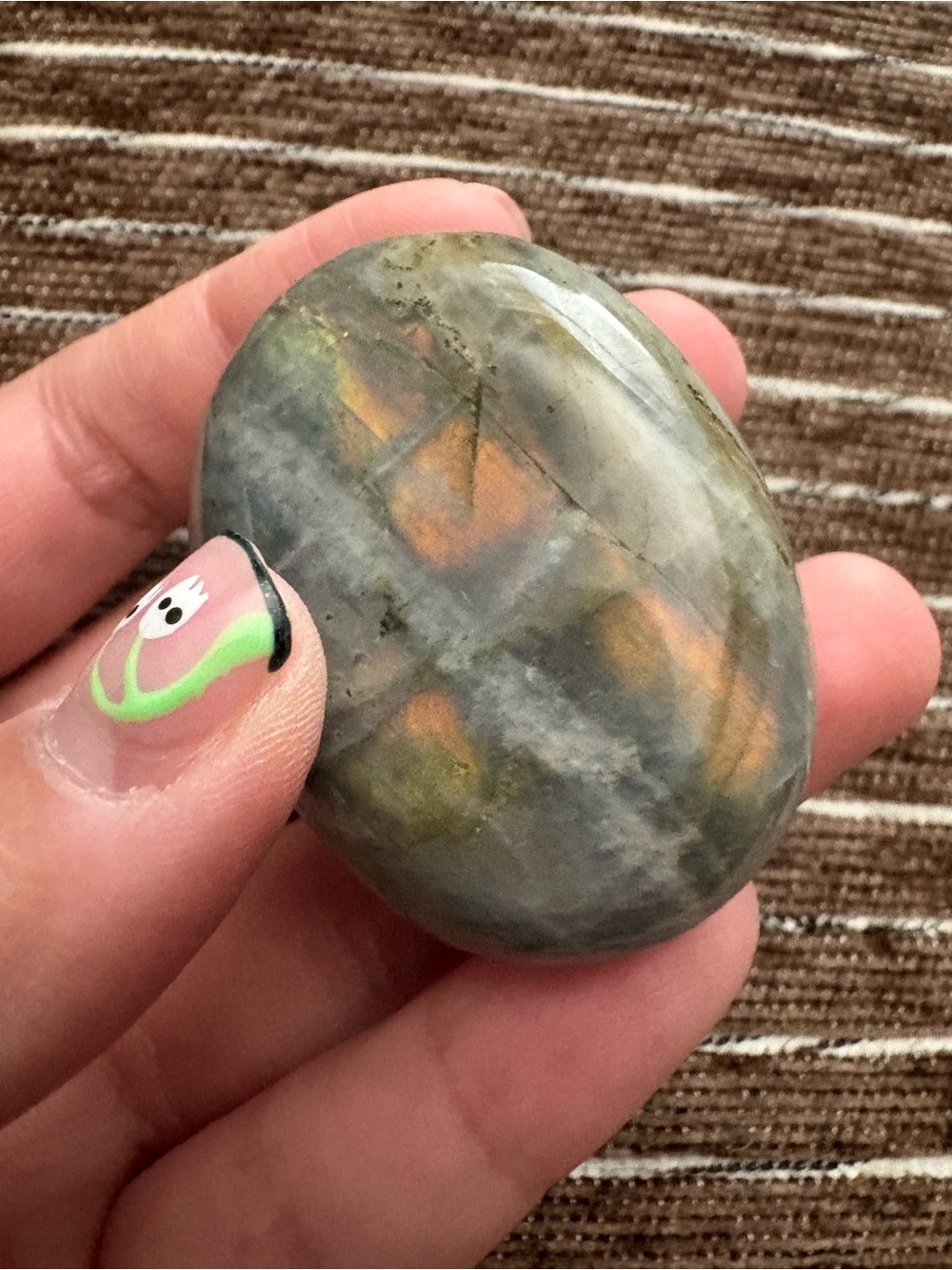 Polished sunset Labradorite palm Stone